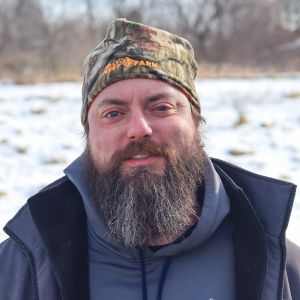 Zach Lange Zach, a pest control professional with Advanced Wildlife and Pest Control, standing in uniform ready to assist with humane wildlife and pest solutions.