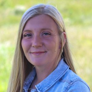 Erica, an office administrator with Advanced Wildlife and Pest Control, ready to assist you with your pest control needs.