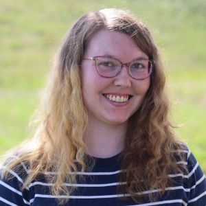 Paige, an office administrator with Advanced Wildlife and Pest Control, ready to assist you with your pest control needs.